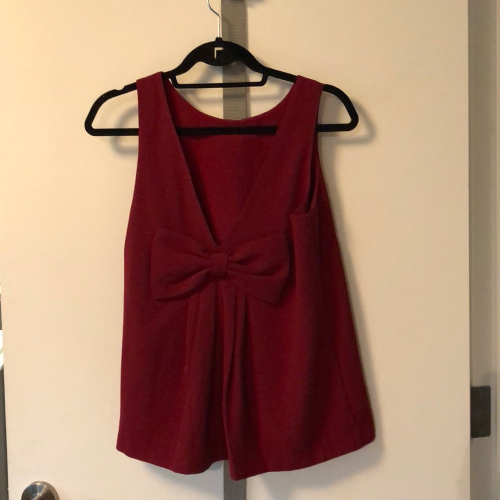 Dark red top with low back and cute bow!